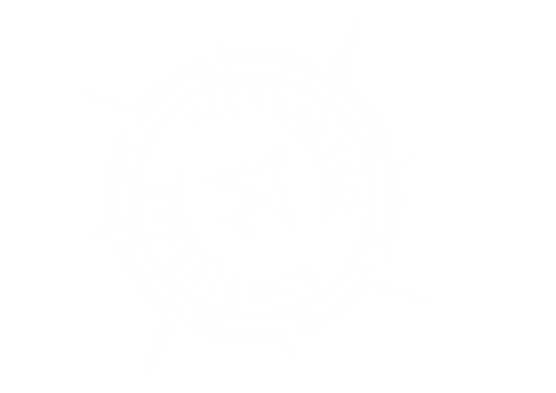 A white circular logo with a plane and text.
